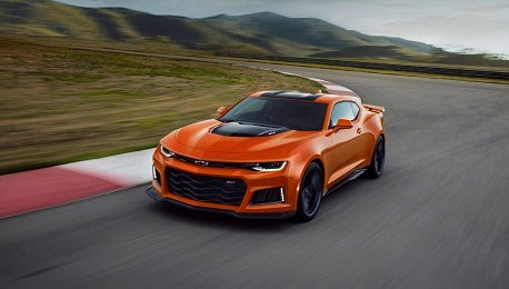 brand new 2023 Chevrolet Camaro speeding down the highway
